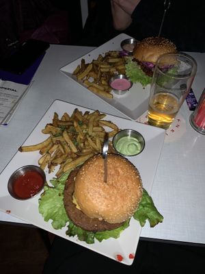 cheezy burger and pulled seitan burger, fries, dill mayo, ketchup, rose horseradish, and thousand island dip at Neue Republik Reger in Berlin