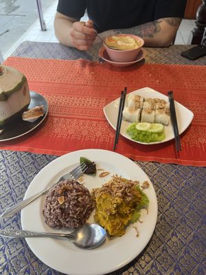 Bottom pumpkin hummus with rice, middle: fresh spring rolls, top: tom kha  at May Kaidee in Bangkok