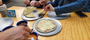 Ever heard of blue corn crust pizza? You'll taste it with us! All ingredients are locally sourced and the vegan cheese is home-made at Travelling Herbivore in Mexico City
