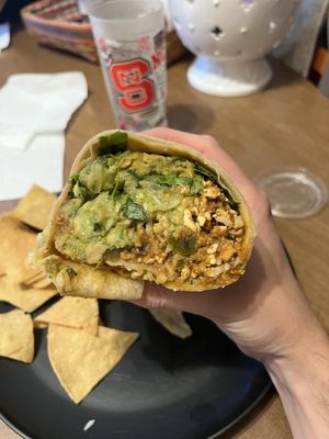 Sofritas Burrito (double sofritas, veggies, guac, white rice, no beans, corn salsa, romaine lettuce, and spicy red sauce)  at Chipotle - Crossroads Blvd in Cary