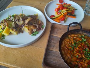 Polenta with shrooms, baked beans and grilled veggies at Lačni Kekec in Kranjska Gora