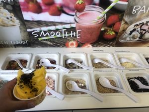mango ice cream and various toppings  at Lucka Ice cream in Kranjska Gora