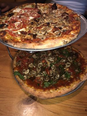 The vegan flatbread is the one on the bottom! at Flatbread Pizza in Paia