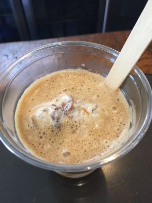 An affogato (ice cream with espresso on top) made with a double espresso and our homemade vegan almond joy sorbet! at The Village Coffee & Cream in Shrewsbury