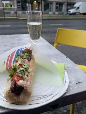 Still the same - colourful neighborhood bar with nice vegan options. And kitchen is open quite late. - This is vegan hot dog in the photo    at Bar Favela in Helsinki