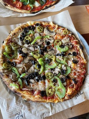 Vegan pizza with mushrooms, olives, green peppers and jalapeños  at Blaze Pizza in Lake Buena Vista