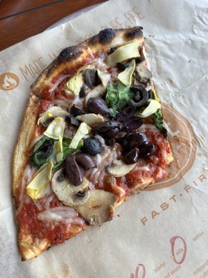 Build your own half pizza (1 piece eaten pre-photo)  at Blaze Pizza in Lake Buena Vista