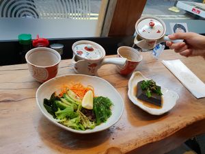 Two green teas, seaweed salad and black tofu with tender steam broccoli(cold) at Shoryu Ramen in London