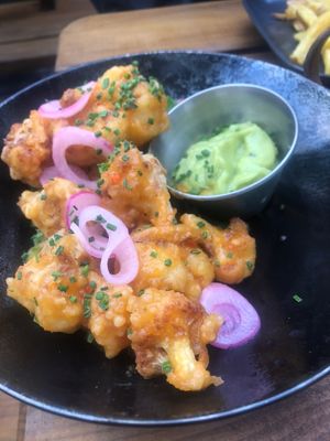 Spicy cauliflower popcorn with guac - sweet and quite spicy!  at Bighorn Bistro & Bakery in Chamonix-mont-blanc