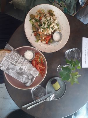 Greek salad, pesto sourdough panini and sweet dammsugare at Mirells in Visby