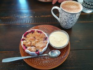 Raspberry pie with Oatly vanilla sauce at Mirells in Visby