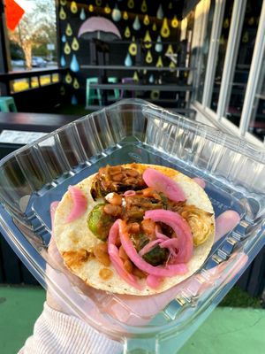 Brussel sprout taco with pinto beans and pickled onion! at Taco Dirty in Tampa