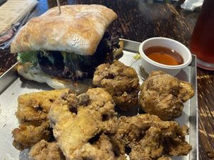 Sass burger (vege pattie, lettuce, aioli, vegan cheese, mushrooms, avo) and cauliflower with maple syrup  at Bacon Brothers in Christchurch