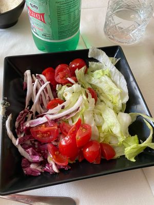 Fresh side salad at Trattoria Portixedda in Oristano