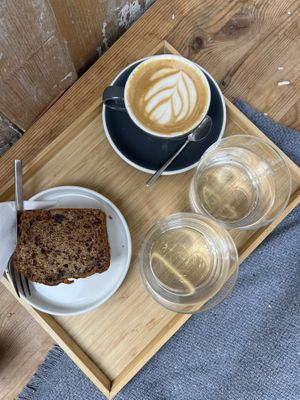banana bread & cappuccino w/ pea milk  at Kafe Friedrich in Brno