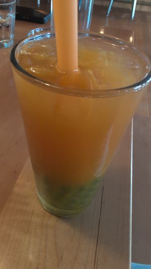 Passion fruit tea with kiwi boba at Yum Yum Noodle Bar in Red Hook