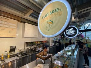 Hot counter serving plant-based burritos at Planet Organic - Tottenham Court Rd in London