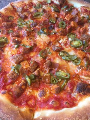 Vegan Buffalo Chik’n Pizza with jalapeños  at Turnpike Cafe in Canton