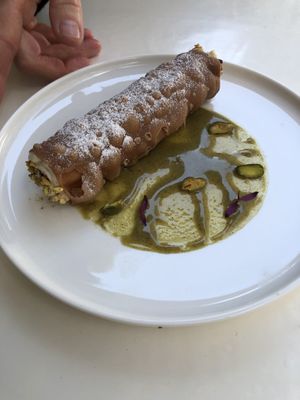 Cannolo siciliano aux pistaches et ricotta d’amande maison  at brEAThe Restaurant - Pigalle in Paris