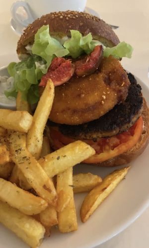 Burger with cashew cheese  at brEAThe Restaurant - Pigalle in Paris