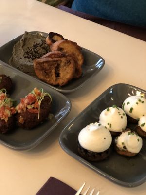 Entrées à partager (black houmous+champignons+bouchées )  at brEAThe Restaurant - Pigalle in Paris