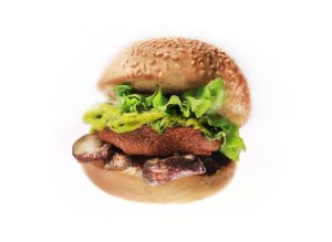 Burger. Breaded seitan, Cajun mayonnaise, coriander avocado cream, snacked portobello mushroom, served with french fries at brEAThe Restaurant - Pigalle in Paris