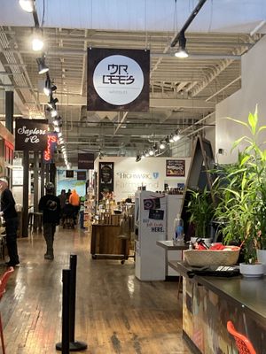 The noodle shop sign & cash register stand (where the plant is). at Mister Lee's Noodles in Easton