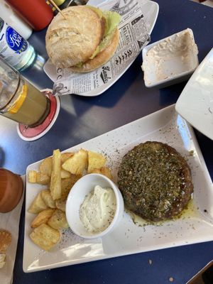 Beyond meat burger (top) burger of the day (bottom)  at Sa Capca in Blanes