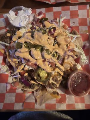 Beyond super nachos yummy!! Lentils, beyond meat, chipotle aioli, cabbage, jalapeños, etc  at Old Shillelagh in Detroit