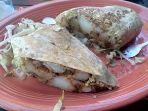 Nov.3, 2025 Tried Vegan Potato Chorizo Burrito. I also had a Elderflower Margarita. They also offered a dog bowl of water and I ordered a dog burger. at Cantina Azteca in Carmichael