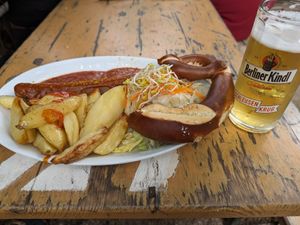 Great vegan currywurst, and vegan alcohol free beer in a lovely garden in the park! at Schleusenkrug in Berlin