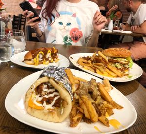 Vegan coney dog, big mock, and the brush park (vegan chicken hani) at Chili Mustard Onions in Detroit