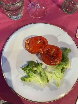 Baked tomatoes (secondi) with a very sad and limp salad on the side   at Ristoro Dantesca in Pisa
