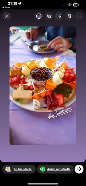 Antipasto vegano con frutta e formaggi vegani  at Ristoro Dantesca in Pisa