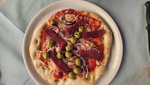 Pizza Tonno Vegano at Ristoro Dantesca in Pisa