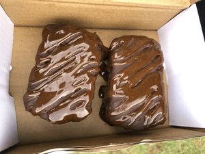 Chocolate cake with caramel on top (they were previously frozen)  at Raw Raw Raw in Fremantle