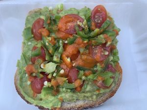 Spicy avocado toast... this sh!t is SPICY I DO NOT RECOMMEND FOR PEOPLE WITH A LOW SPICE TOLERANCE!!!!! My lips are 🥵 burning  at Thrive Juice Cafe in Arlington