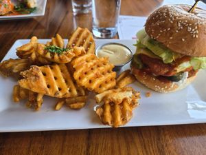 Buffalo sandwich with waffle fries at O'cado in Sherman Oaks