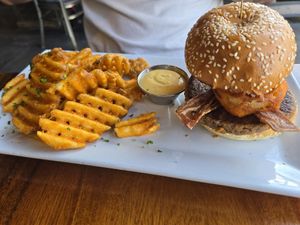 Smokin boss burger with waffle fries at O'cado in Sherman Oaks