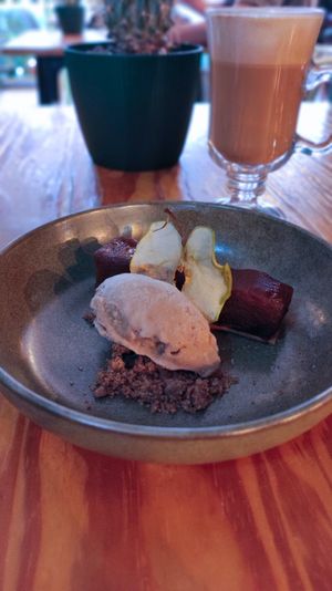 Layered apple dessert baked in the oven with chai ice-cream at Orteá - Vegan Collective in Lisbon