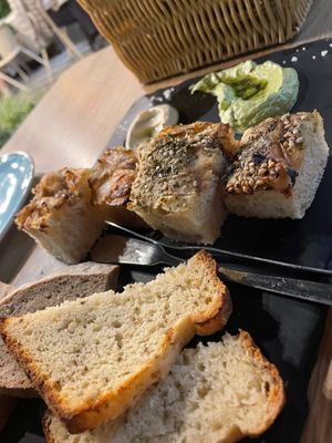 The toasted bread was tasty, but the pâté and cheese was a great combo; and a tasty polenta as well. at Orteá - Vegan Collective in Lisbon