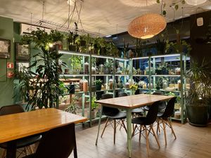 Interior. It’s got a lot of plants as decor!  at Orteá - Vegan Collective in Lisbon