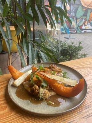 Root: bean puree, sautes spinach, parsnip and pumpkin, cauliflower in miso, tofu and carrots  at Orteá - Vegan Collective in Lisbon