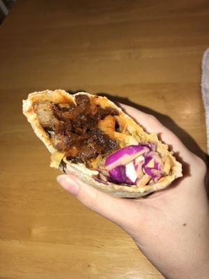 Earth Crunch Wrap (gochujang gives it a good kick ❤️‍🔥)  at Earth Burger in San Marcos