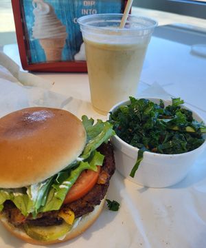 Quinoa burger, kale salad and shake. at Earth Burger in San Marcos