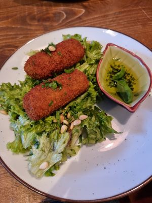Croquette with salad and bread at Nissa cafe in Hillegom