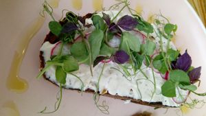 Sourdough toast with vegan cream cheese, radish and microgreens. at Bean and Bread in Abergavenny