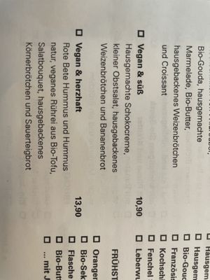 Vegan breakfast: one sweet with chocolate and Fruits and more… and one with hummus, beet root, salad and roll (and more)  at Cafe Sehnsucht in Cologne