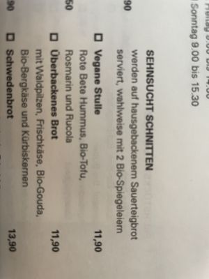 One sandwich is vegan with beet root hummus and tofu  at Cafe Sehnsucht in Cologne