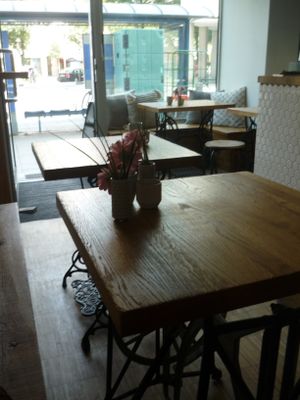 Tables from old sewing machines at Iss Dich Glücklich in Munich